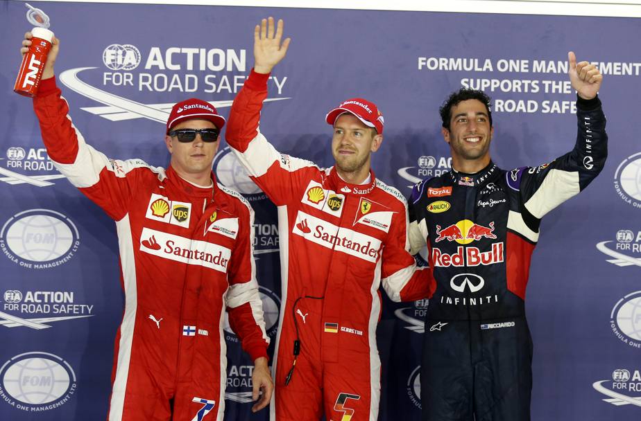 I primi tre in qualifica a Singapore: il poleman Vettel  al centro fra Raikkonen (3) e Ricciardo (2). Reuters 